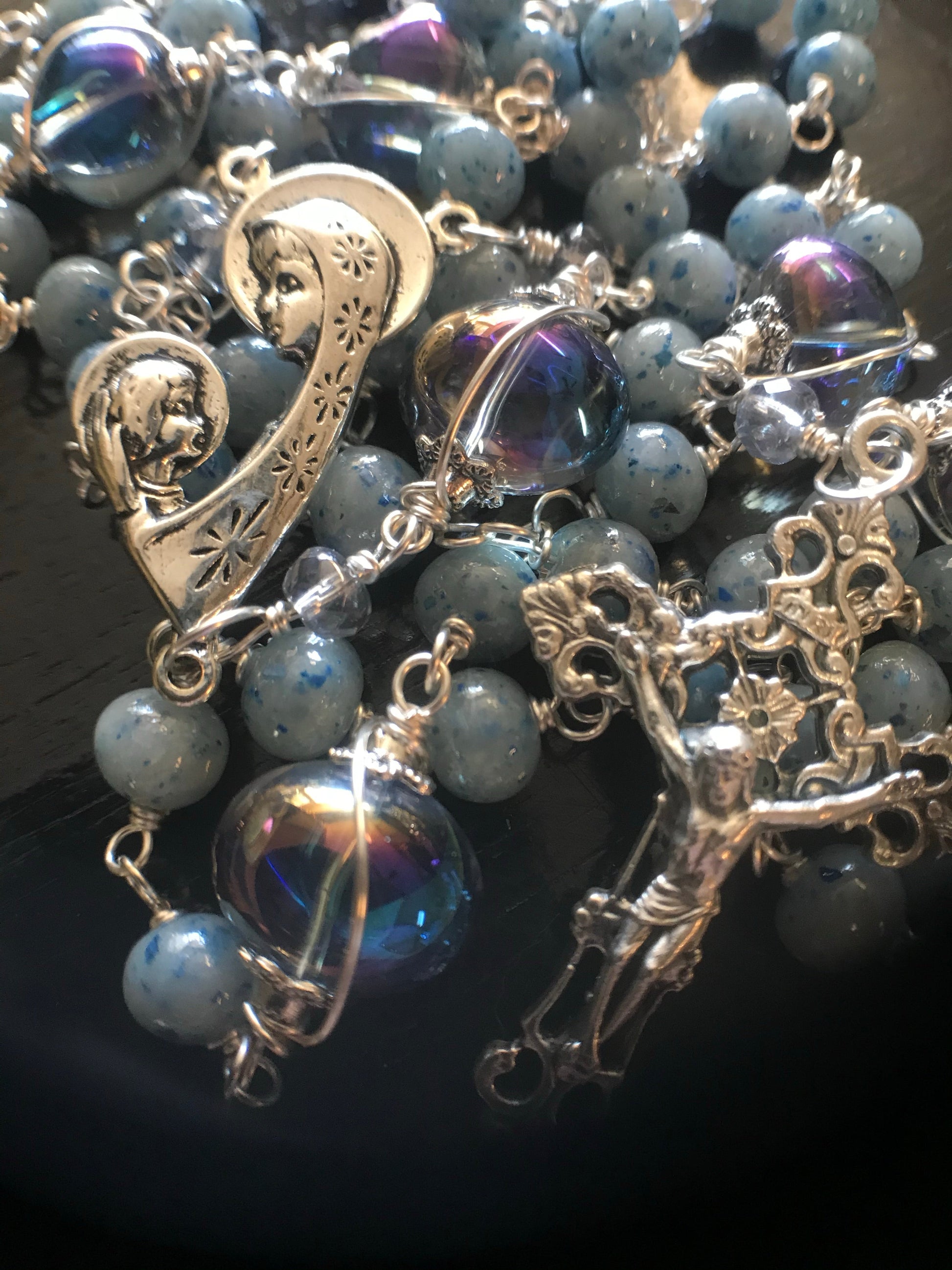 Cord rosary colour and iridescent beads color Blue